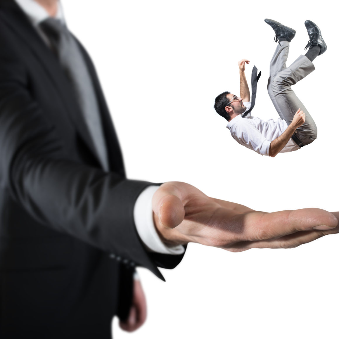 Businessman Is Saved From A Big Hand. Concept Of Business Support And Assistance