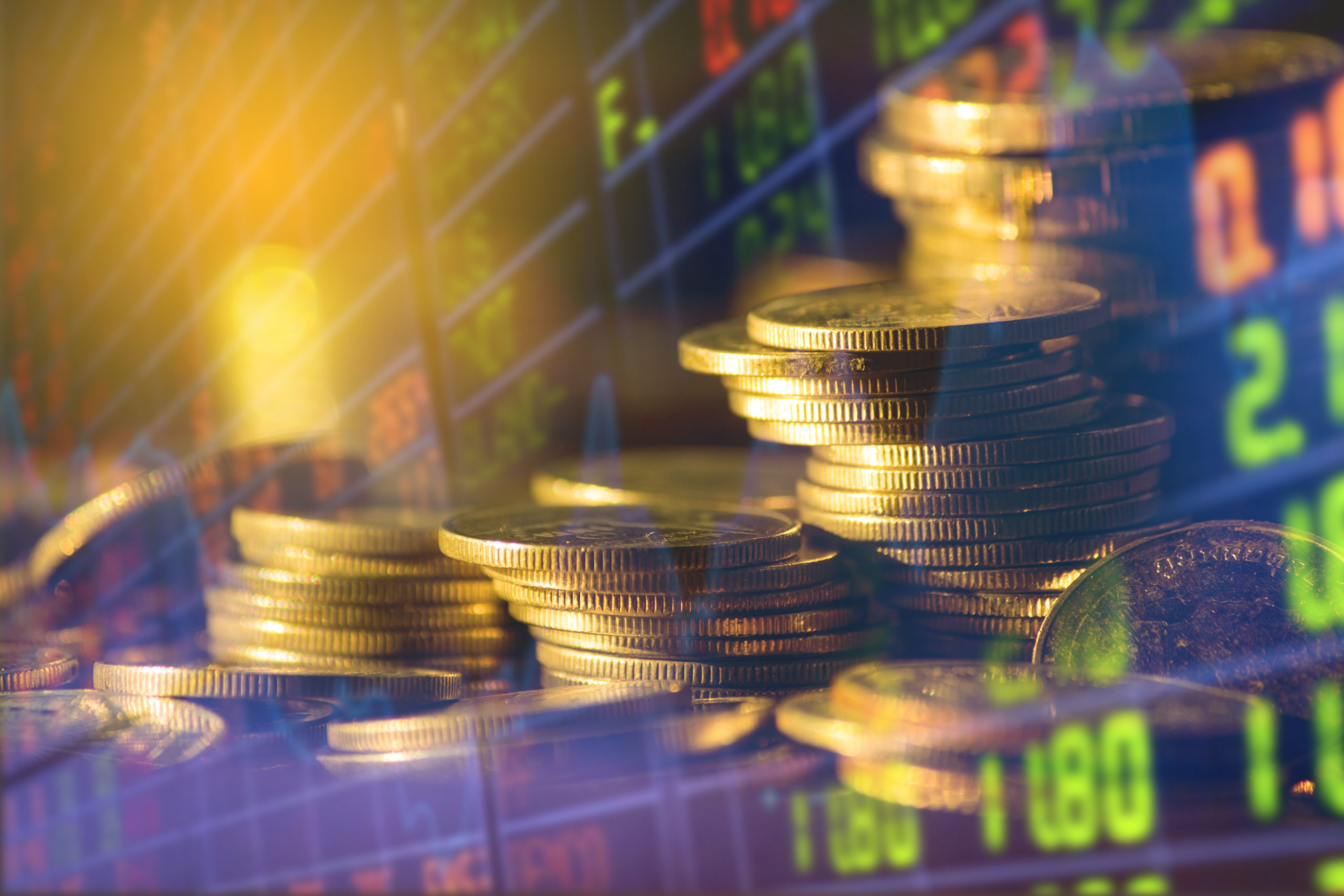 Stack Of Money Coin And Double Exposure Of Graph And Rows Of Coins For Finance And Business Concept