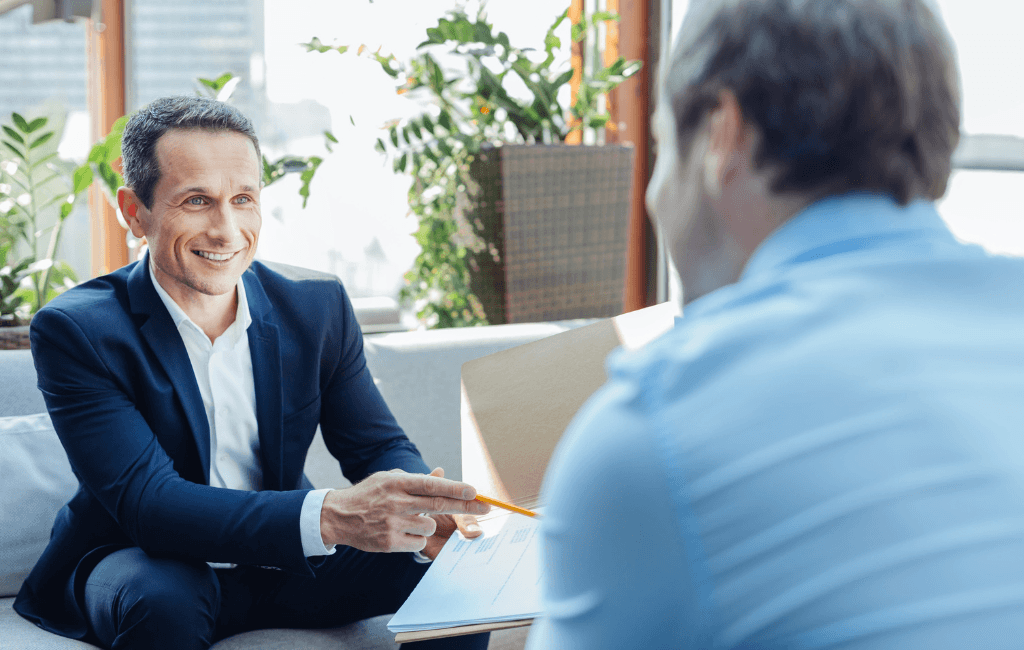 Financial adviser discussing Division 296 tax and superannuation strategy with client in Australia